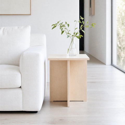 Minimal square side table in a clean interior