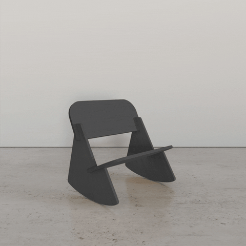 Modern minimalist black chair with unique design, perfect for contemporary home decor.