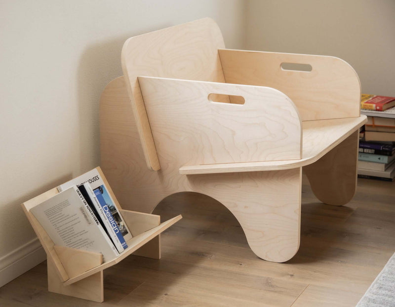 Lounge chair with built-in side magazine holder