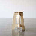 A-Stool made from birch plywood, featuring clean lines and a solid build, perfect for sitting or perching.