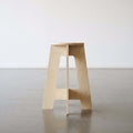 A-Stool made from birch plywood, showcasing clean lines and simplicity in design.