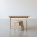 DIY kids table and chairs set in light wood, ideal for arts, crafts, and homework, made from eco-friendly materials.