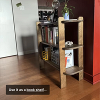 Wooden bookshelf with open shelves, showcasing books and decorative items in a modern living space.