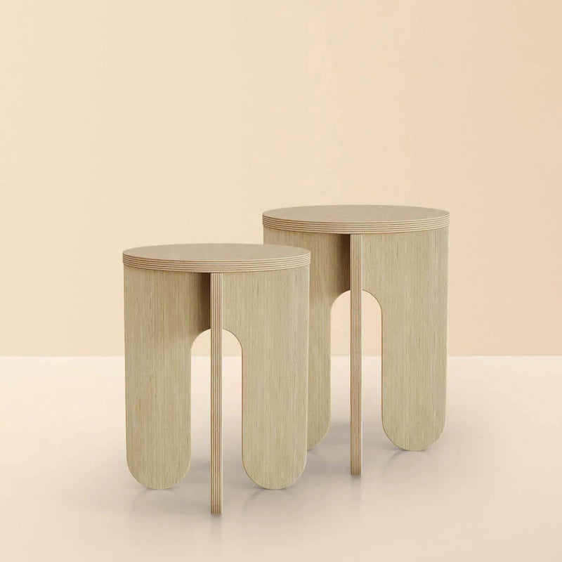 Modern wooden side tables in light color with a minimalist design, perfect for contemporary interiors.