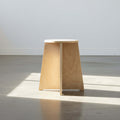 Unfinished wood stool with tapered legs and no-tool assembly design