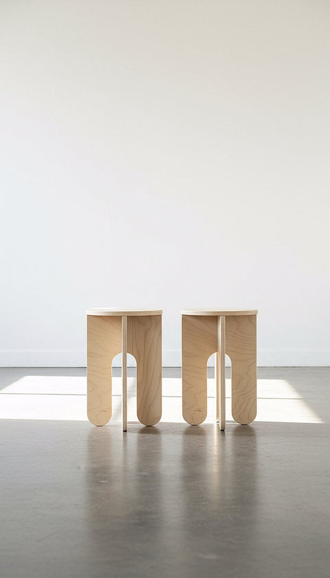 Side Table - Modern unfinished wooden side tables that can be customized for various uses in stylish spaces.